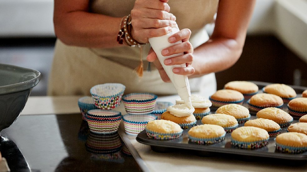 woman baking cupcakes